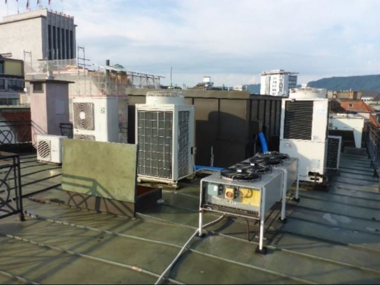 Airconditioning units on a rooftop in Zurich city.